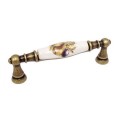 Flora 09- ceramiczny uchwyt meblowy z kwiatem na 96mm