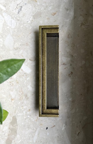 Semi Tango D1 - wpuszczany uchwyt do mebli stare złoto 128 mm.jpg