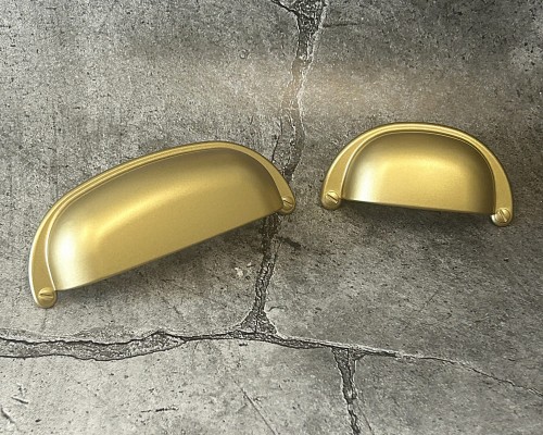 Bacoli N4 – uchwyt muszelka matowe złoto 64 mm.jpg