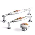 porcelanowe uchwyty do mebli chrom połysk kwiat styl retro włoskie giusti uchwyty bialystok