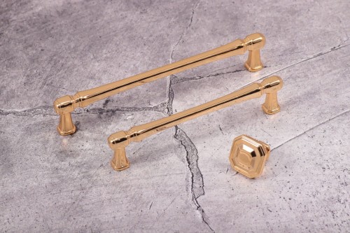 złote uchwyty do nowoczesnych mebli 128mm złote uchwyty do mebli glamour relingowe złote uchwyty włoskie uchwyty do mebli giusti.jpg