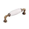 Decorani- stary mosiądz z białą porcelaną 96mm.jpg