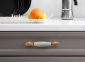 Flora- złoty z białą porcelaną uchwyt ceramiczny.jpg