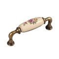 Decorani- stary mosiądz uchwyt ceramiczny kwiatek 96mm.jpg