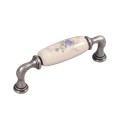 Decorani- stare srebro uchwyt ceramiczny kwiatek 96mm.jpg